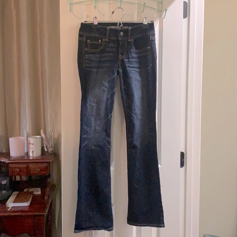 American Eagle kick boot stretch. Darker was with distressing.